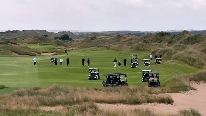 President Donald Trump plays golf after cutting ribbon at opening ceremony of new course