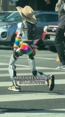 Excited Person Shouts While Robot Runs Down Street