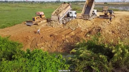 Best Impressive Bulldozer Komatsu D58P Coupled with D51P Pumps Dirt Into Water Filling the Lake
