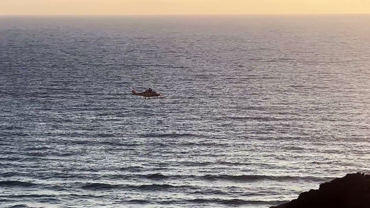 Emergency services at Mawgan Porth where a man was died after being recovered