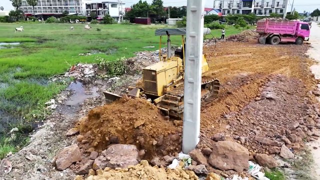 Wonderful First Starting New Project.! Land Filling by Skills KOMATSU dozer With​ Trucks Unloading