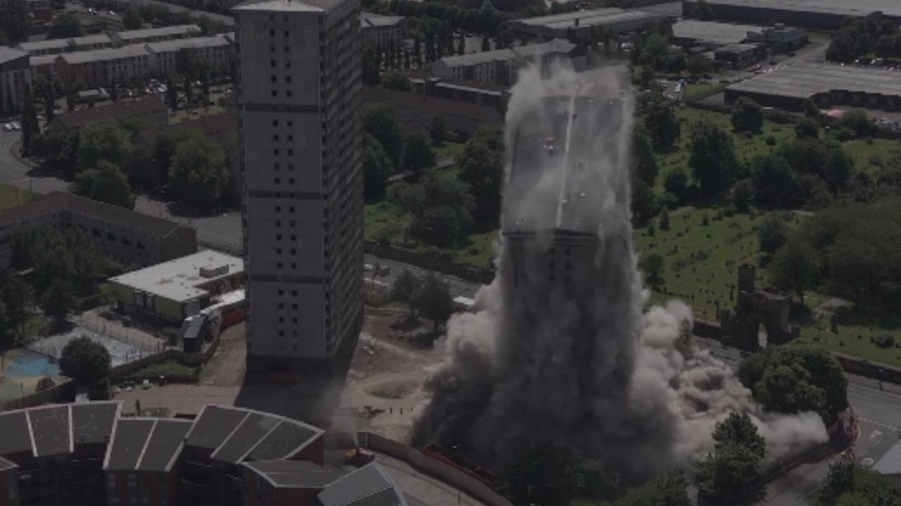 Controlled demolition destroys high flats in the blink of an eye