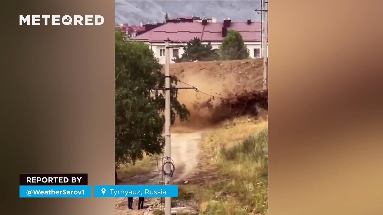 A massive avalanche of water, mud, and rocks wreaks havoc in Tyrnyauz, Russia. The phenomenon struck suddenly, taking residents by surprise