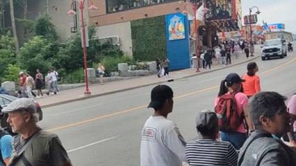 Guy lives his best life by riding down Clifton Hill in his wheelchair