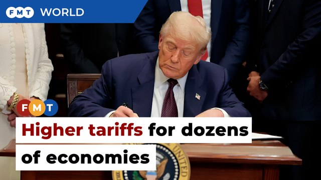 Trump signs order to impose higher tariffs on dozens of economies