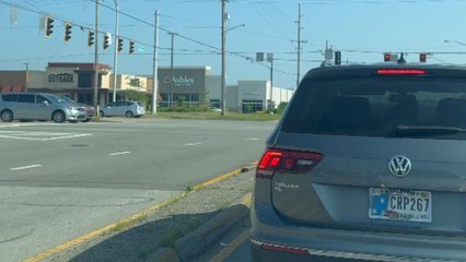 Giant windmill blade transported down the road in broad daylight
