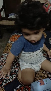 loaded diaper about to leak, but baby isn't allowing us😄