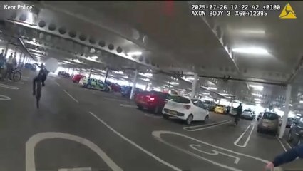 Moment reckless teenage cyclist performing wheelie towards officer tackled to ground