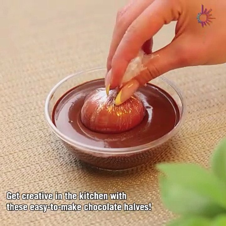 Homemade chocolate halves coming together in no...