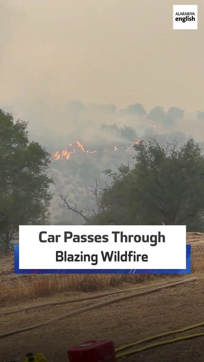 Car Passes Through Blazing Wildfire