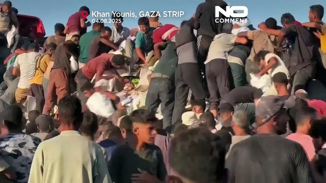 Crowds gather around aid trucks in Gaza as food shortages persist