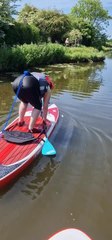 Woman Falls During Paddleboarding