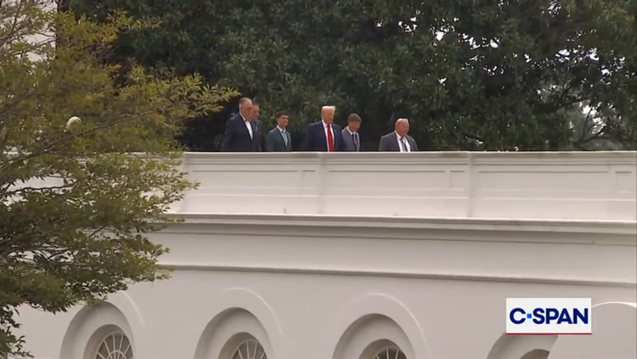 Watch Donald Trump walk on top of White House roof: ‘Taking a little walk’