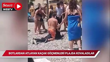Botlardan atlayan göçmenleri plajda kovaladılar
