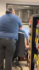 Man Pranks Another by Pouring Ice Water Down His Shirt