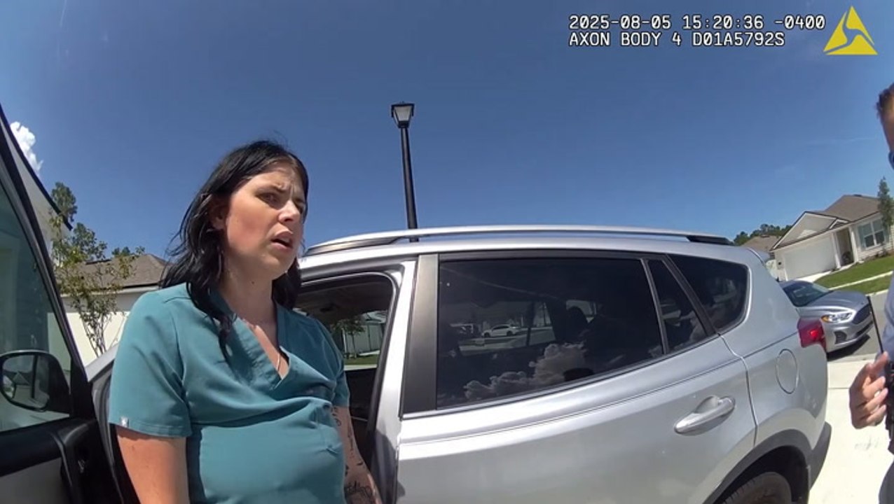 Moment fake nurse who treated 4,000 patients without a license is arrested by police