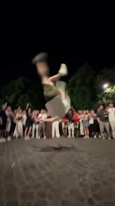 Man Smacks Camera While Doing Backflips