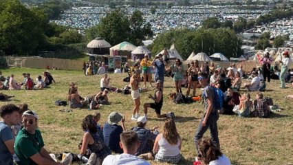 Man proposes during Glastonbury Festival and crowd joins in to celebrate the joyful moment