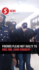 Two men claim trial to robbing Chinese national of RM2.1mil