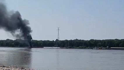 Horrified onlooker films after helicopter hits power lines and crashes into Mississippi river, killing two