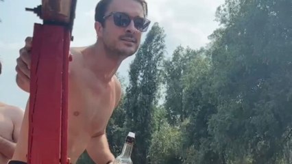 Man embarrassed with unexpected plunge while jumping between boats at fun bachelor party