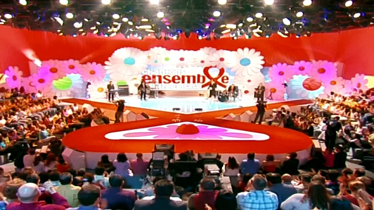 Elsa et Alain Chamfort — “Duel au soleil” — Elsa et Alain Chamfort (R. Farrel / J. Soligny) | Chantons ensemble contre le Sida — © 2004 TF1 VIDEO