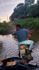 Passenger Falls in Water After Rider Suddenly Speeds up Bike