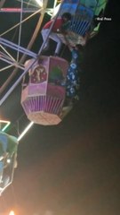 Woman Left Dangling 30 Feet in the Air After Falling From Ferris Wheel Car