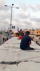 Hamas terrorists take the aid trucks directly into their warehouse. Watch!