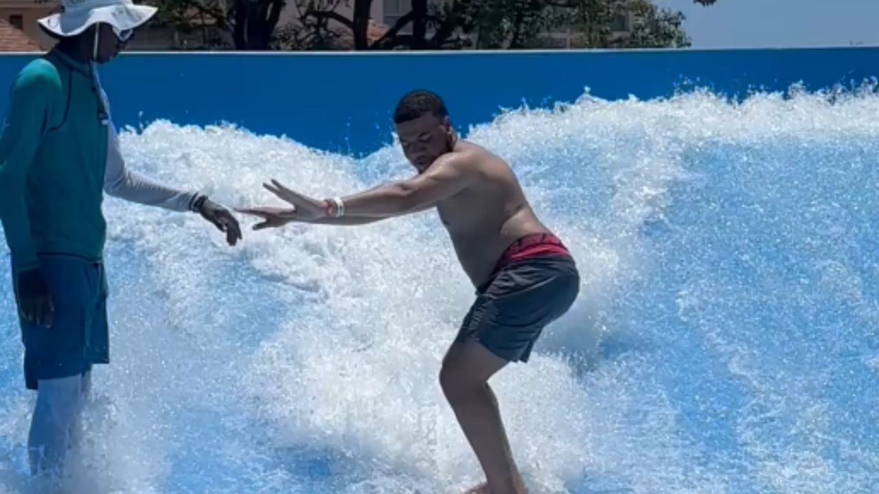 Man loses balance (and underwear) on surf simulator and gets trapped by the waves