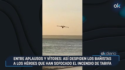 Entre aplausos y vítores: así despiden los bañistas a los héroes que han sofocado el incendio de Tarifa