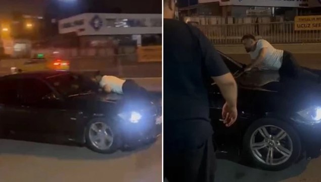 Kıskançlık krizine girdi, aracın kaputuna yatıp kalkmadı