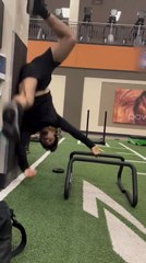Man Tumbles While Practicing Handstand
