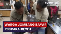 Pajak Bikin Syok, Warga Jombang Bayar PBB Segalon Koin
