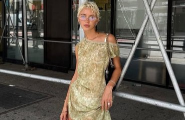 Iris Law sports revealing mini-dress barely covering tight two-piece