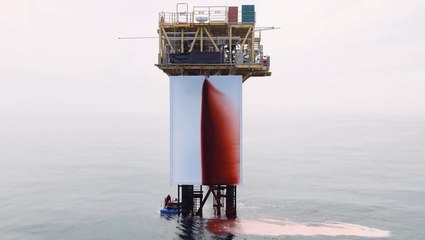 Climate activists spill 1,000 litres of fake blood over North Sea oil rig