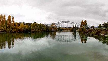 Scenic Autumn View of Bridge Over River