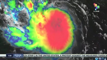 Powerful hurricane Erin downgrades to category 3