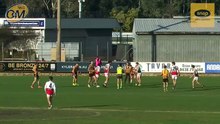 Declan Bren kicks a goal in the final quarter