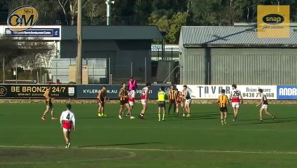Declan Bren kicks a goal in the final quarter