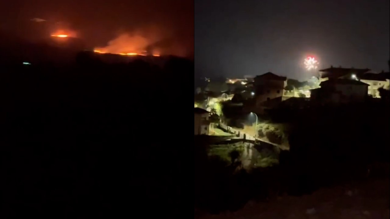 Un pueblo de fiesta con fuegos artificiales mientras al lado Jarilla está envuelta en llamas