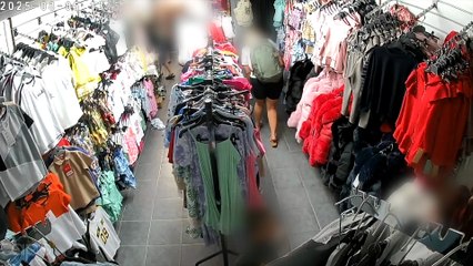 CCTV captures ‘blatant’ shoplifters stuff children’s clothes into rucksack