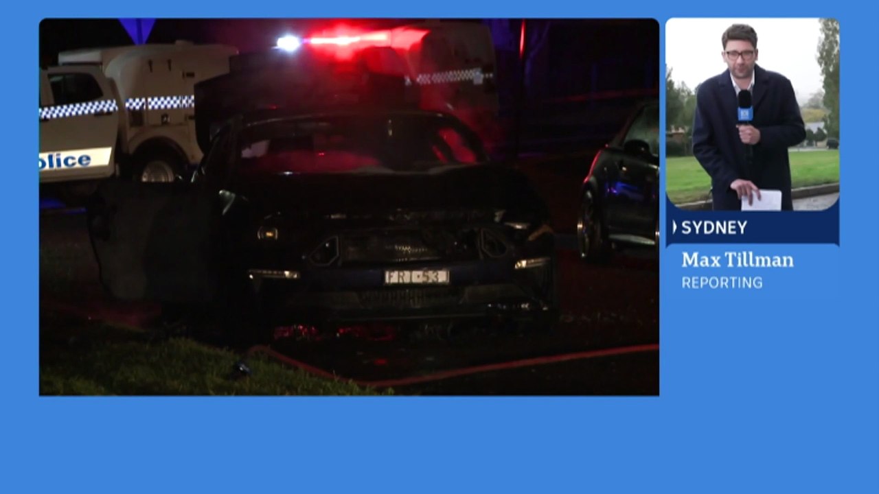 Burnt-out car discovered by police as hunt continues for gunmen in Sydney