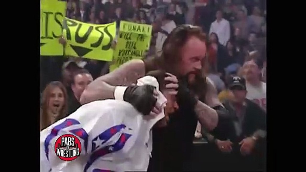 Undertaker throw Kurt Angle from the stage #wwf #wwe #wrestling #wrestlemania