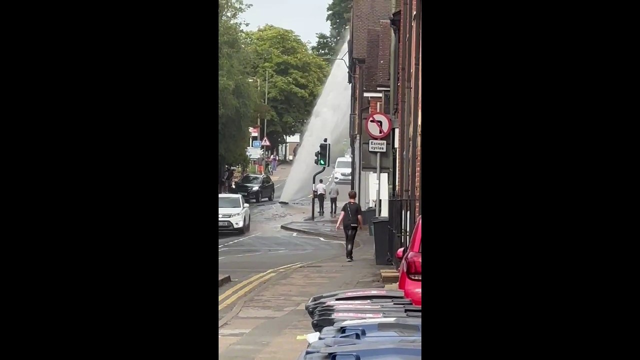 A burst pipe causes a 20-metre water fountain outside Haslemere train station, resulting in major disruption