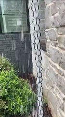 Kusari-doi is a traditional Japanese rain chain used as a decorative alternative to a downspout. It