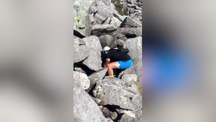 Hikers save baby goat stuck between rocks