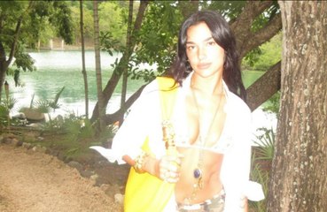 Dua Lipa poses in revealing swimwear during her last days  of being 29