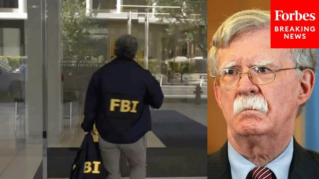 FBI Agent Enters Enters Building Housing John Bolton's Office