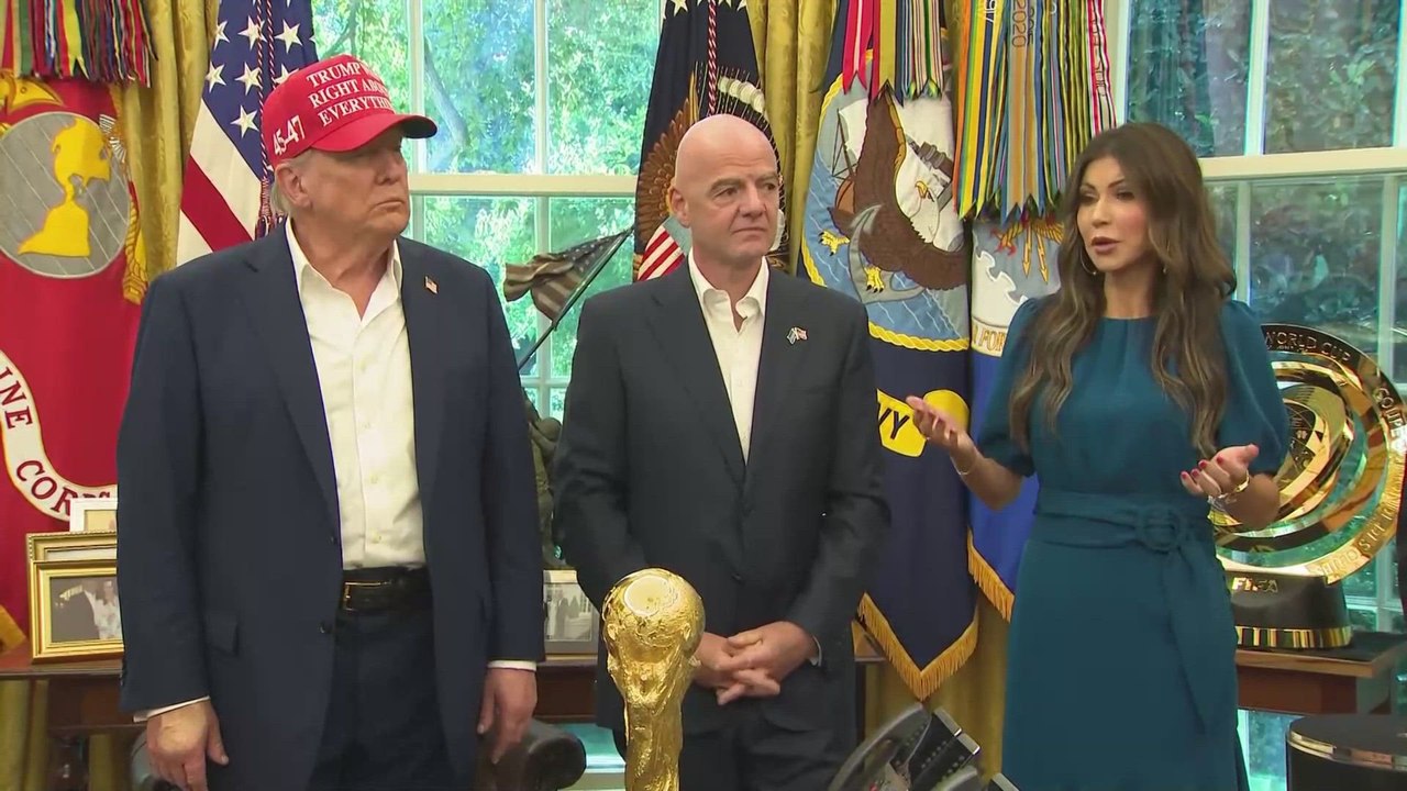 Bizarre Moment: Trump Brings Up Putin Photo, Suggests He Might Come to World Cup